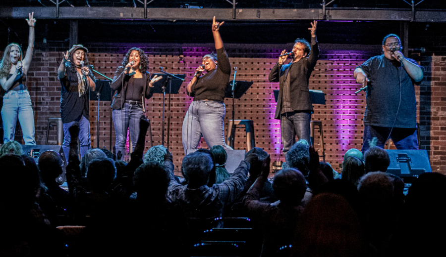 Performers at a Toronto spring festival singing on stage during the SING! Toronto Vocal Festival, celebrating Toronto’s lively music scene in spring 2025.