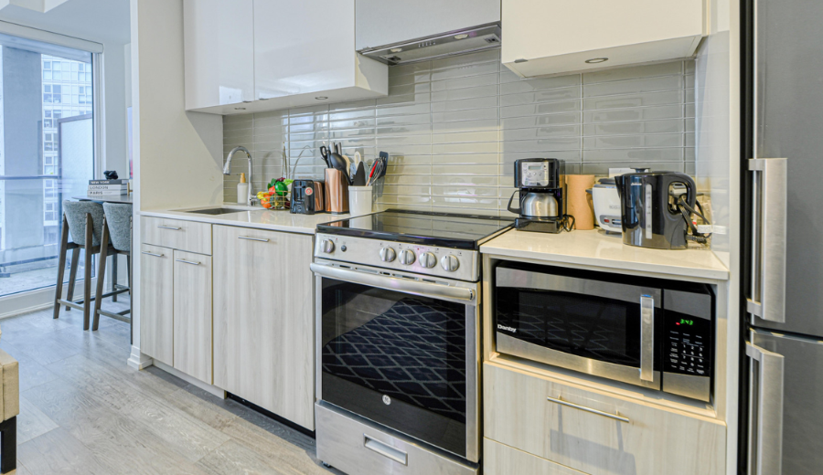 Full kitchen setup highlighting why short-term rentals beat hotels in functionality.