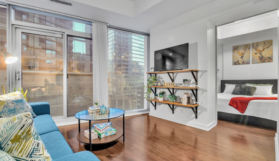 Modern living room showing why short-term rentals beat hotels in comfort and design.