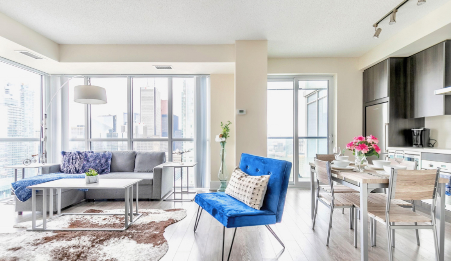 Spacious downtown Toronto short-term rental with city views, modern decor, and open living-dining area—ideal for Valorant team stays during VCT Masters Toronto 2025, hosted by RivetStays