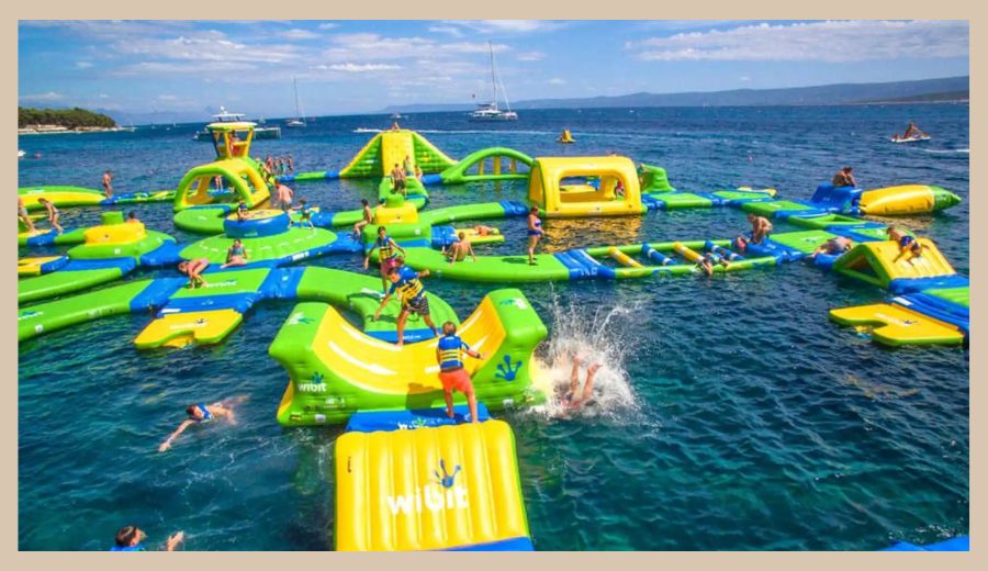 Families enjoying the Ontario water inflatable festival at Bay of Quinte