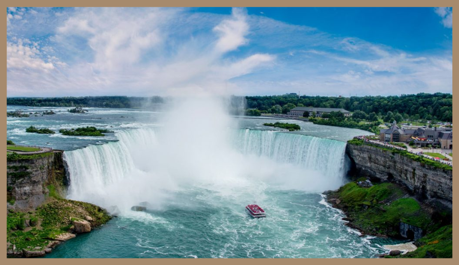 Scenic day trip from Toronto to Niagara Falls with boat at Horseshoe Falls and mist rising