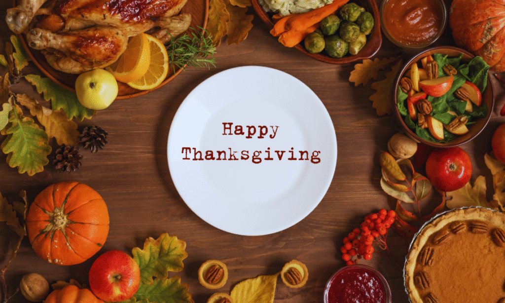Happy thanksgiving in the plate, with fruits and vegetables.