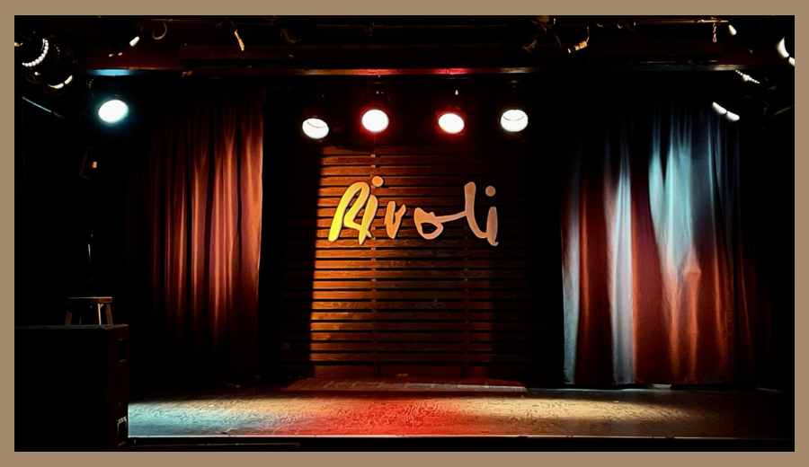 The Rivoli stage with red curtains and lighting, a top live music venue in Toronto.